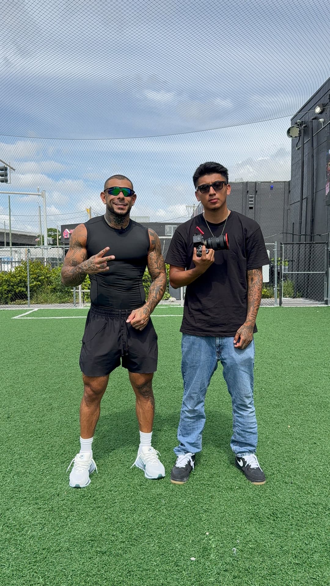 On a turf field with an athlete after a shoot