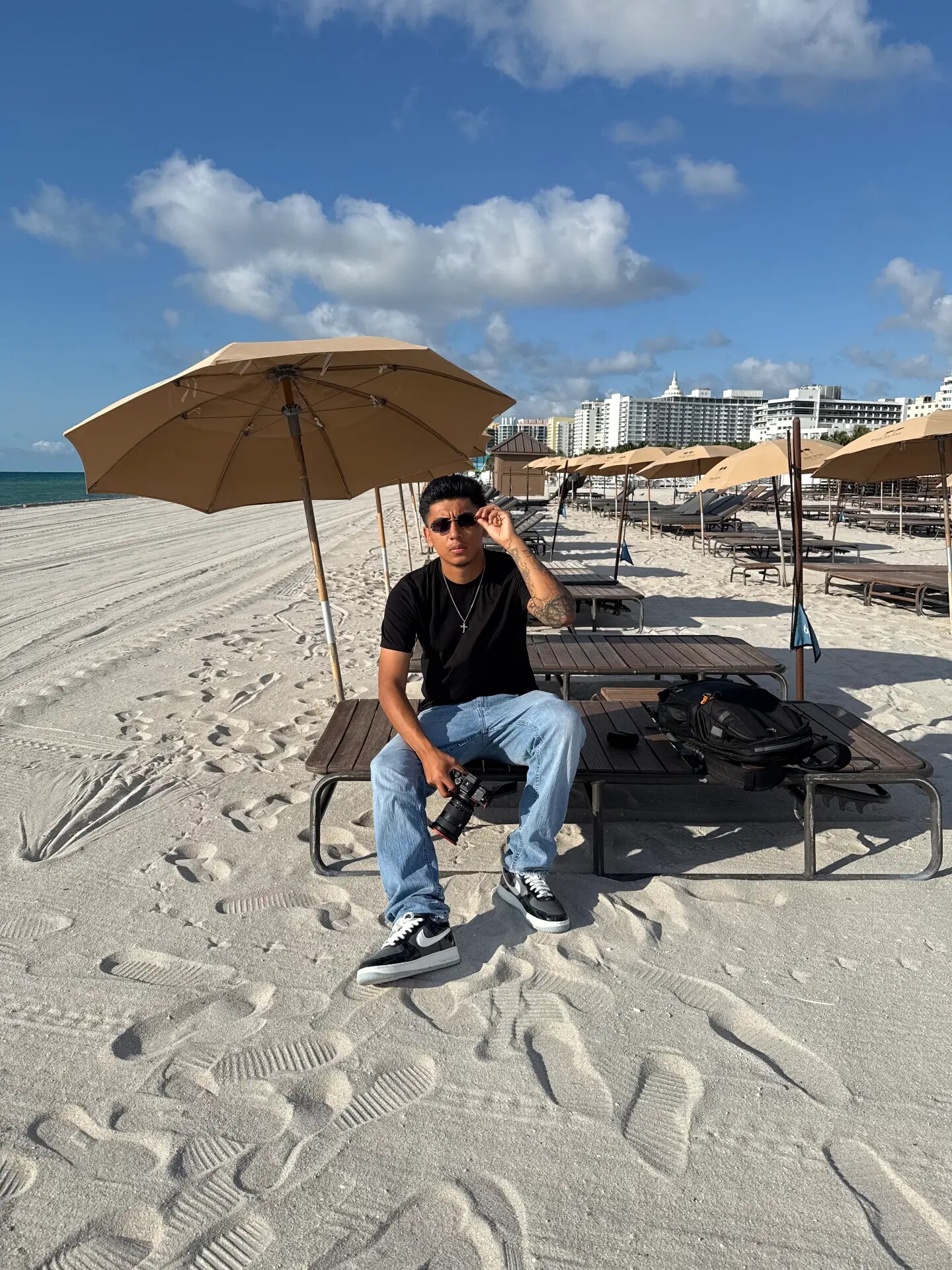 Sitting with a camera on Miami Beach