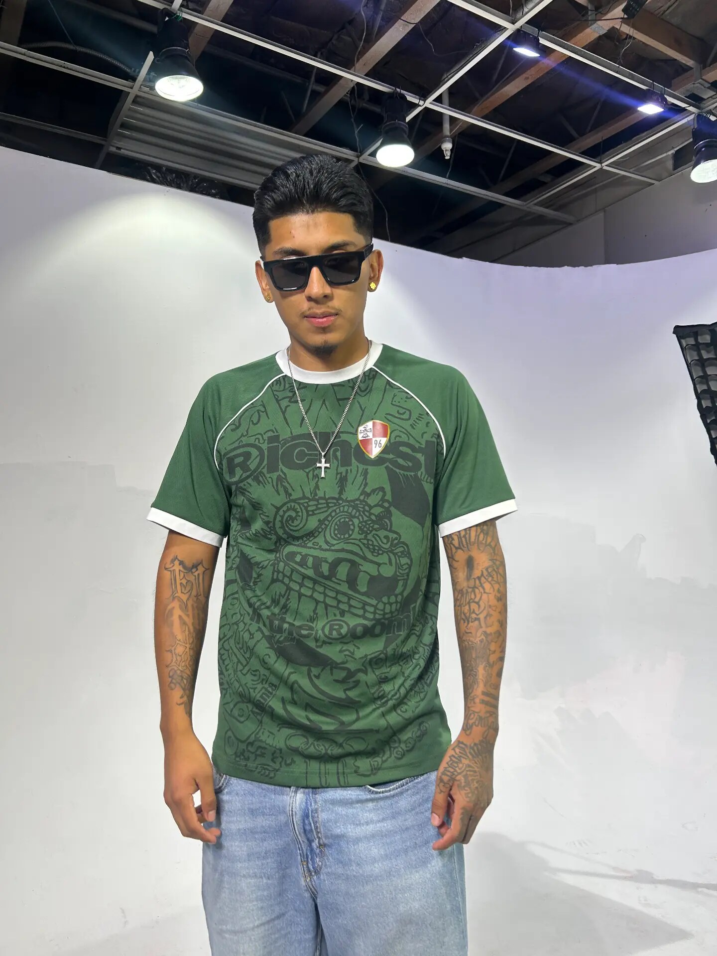 Studio portrait in a green jersey