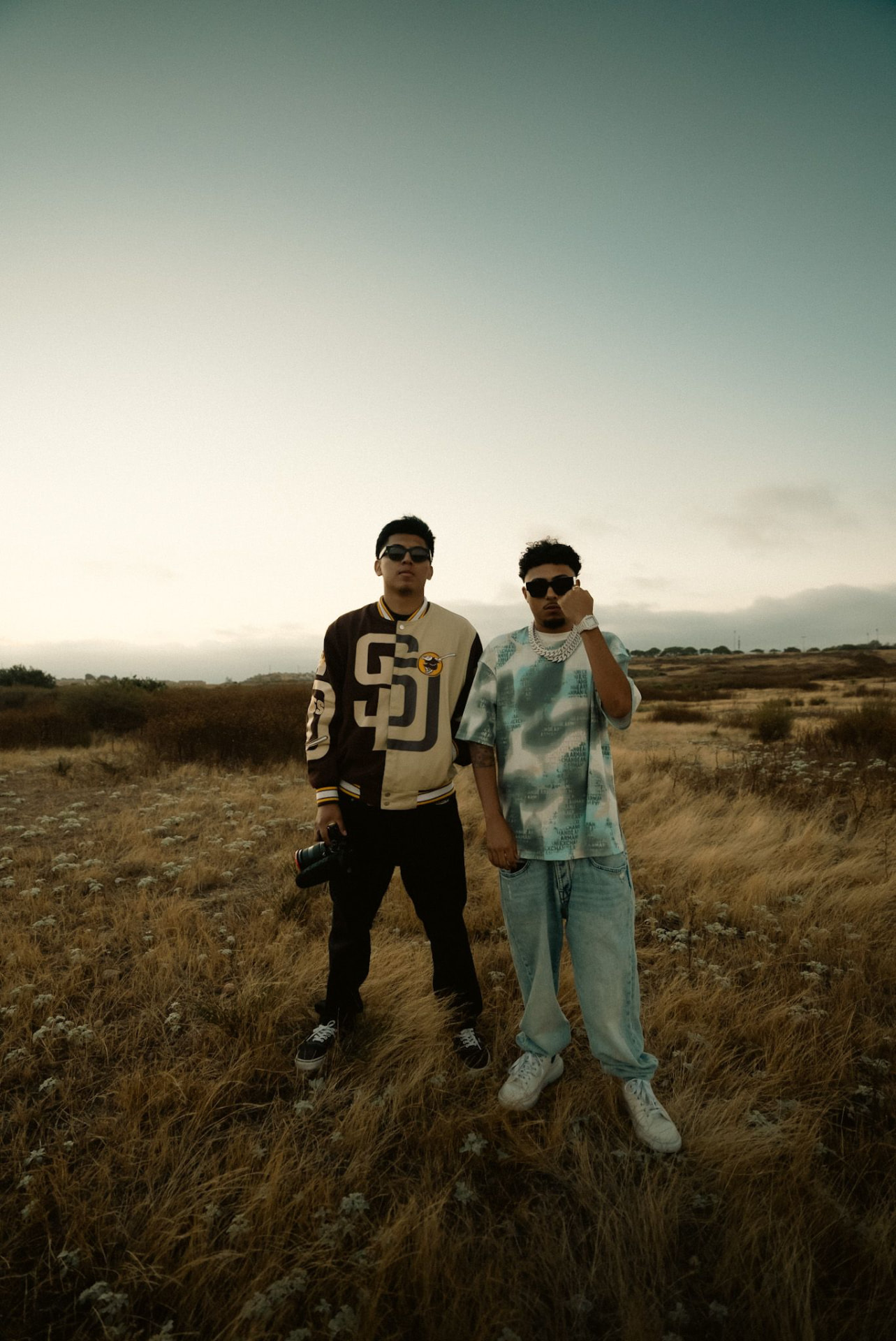 Standing in a golden field with an artist at dusk